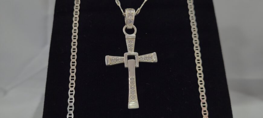 Dije cruz articulada en plata