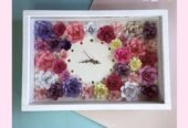 Cuadro y relojes con flores