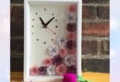 Cuadro y relojes con flores